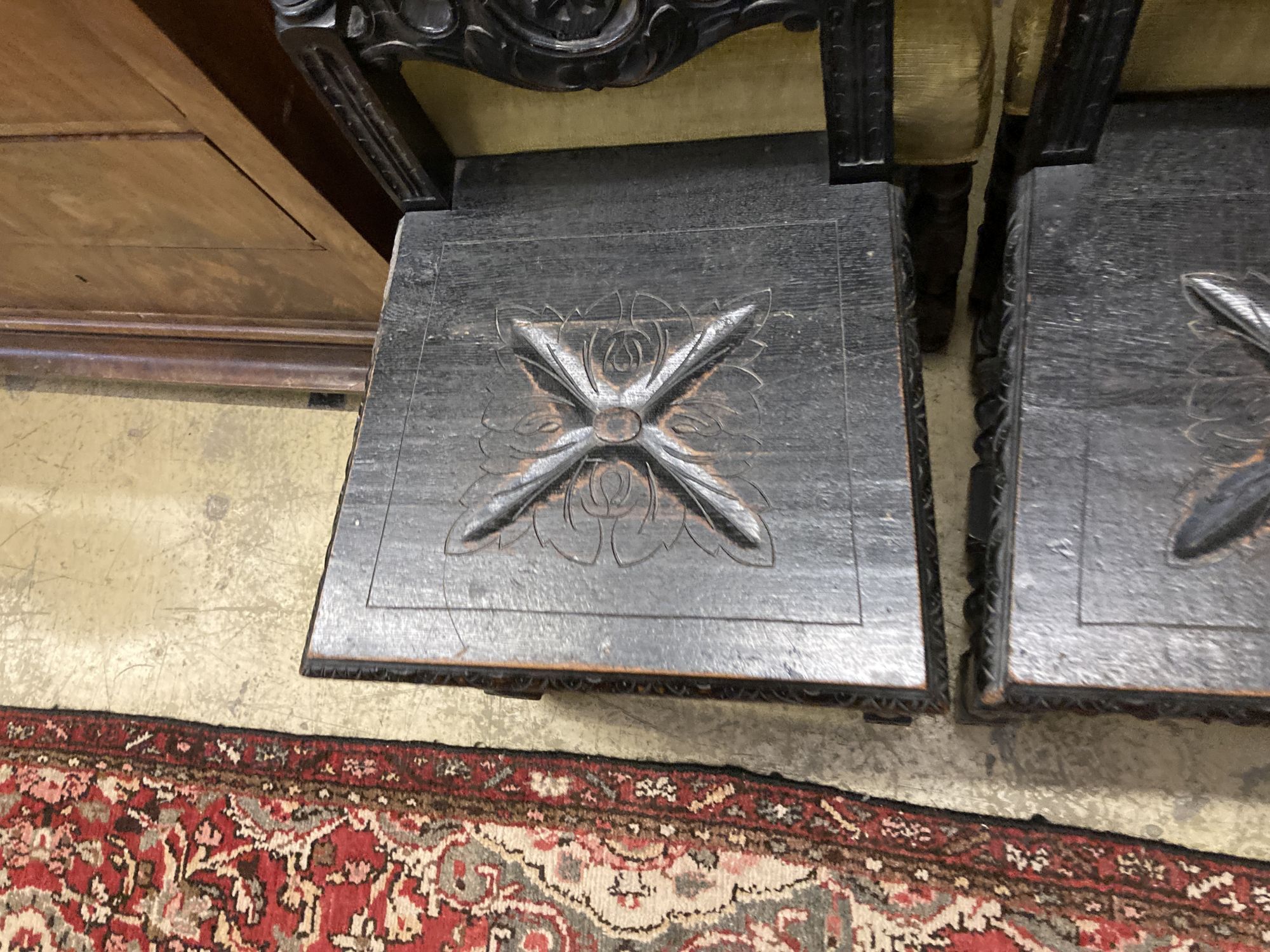 Two pairs of Victorian carved oak dining chairs